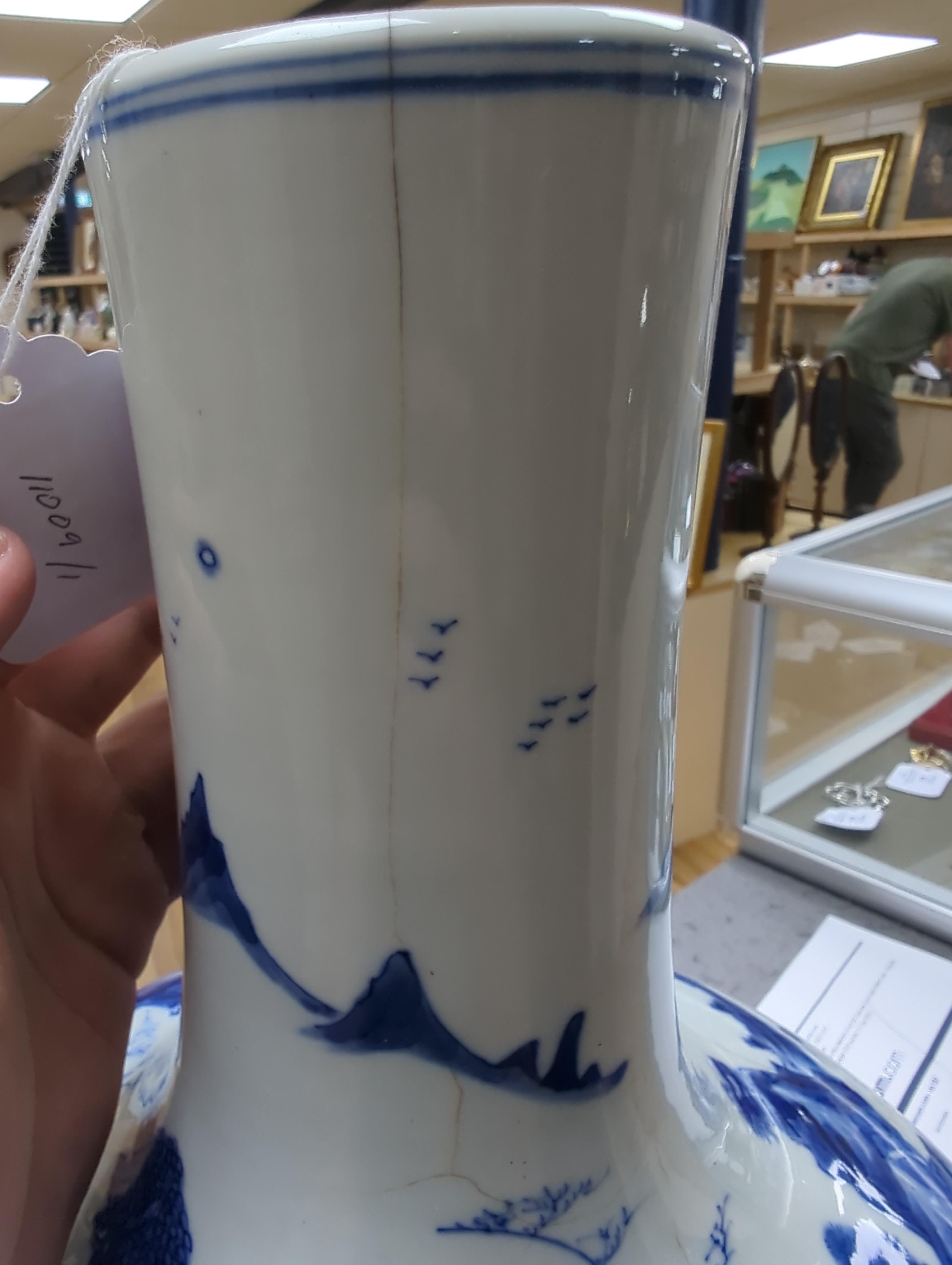 A large Chinese blue and white bottle vase, (a.f) 45cm